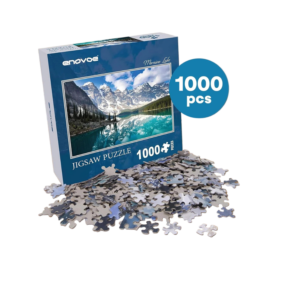 Jigsaw puzzle set with pieces and packaging on a wooden surface